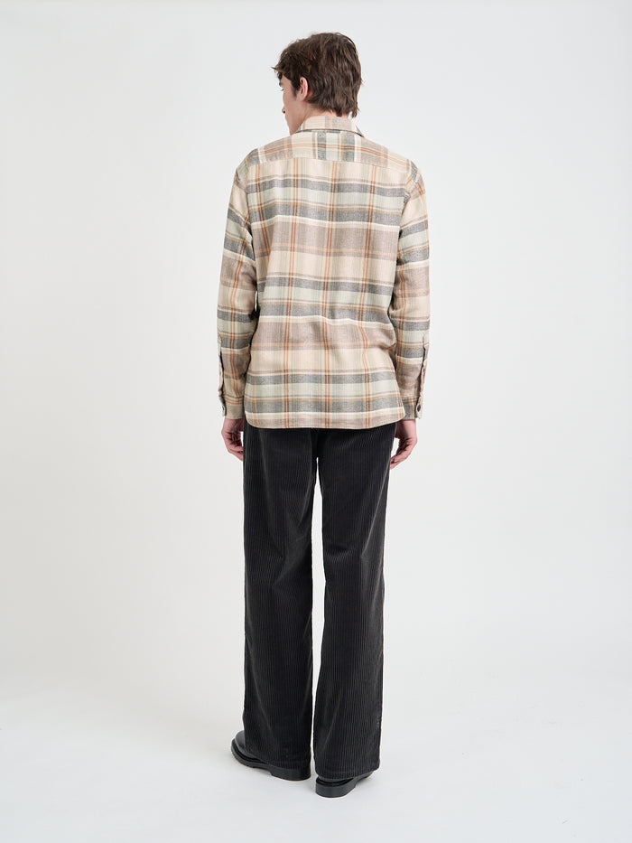 Back shot of model wearing an Oliver Spencer Men's Beige Brushed Cotton Check Overshirt
