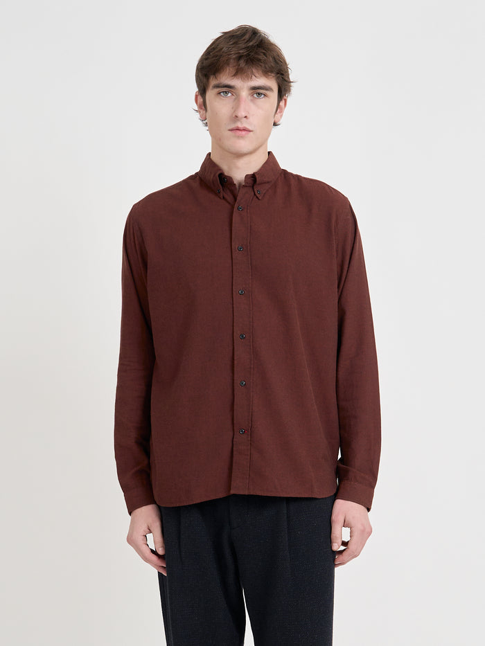 Close up shot of model wearing Oliver Spencer Men's Rust Red Cotton Button-Down Shirt
