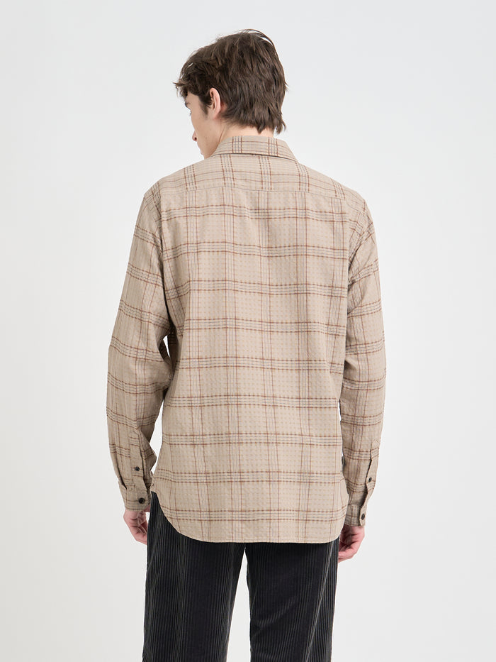 Model is wearing an Oliver Spencer New York Special Shirt in Connell Beige