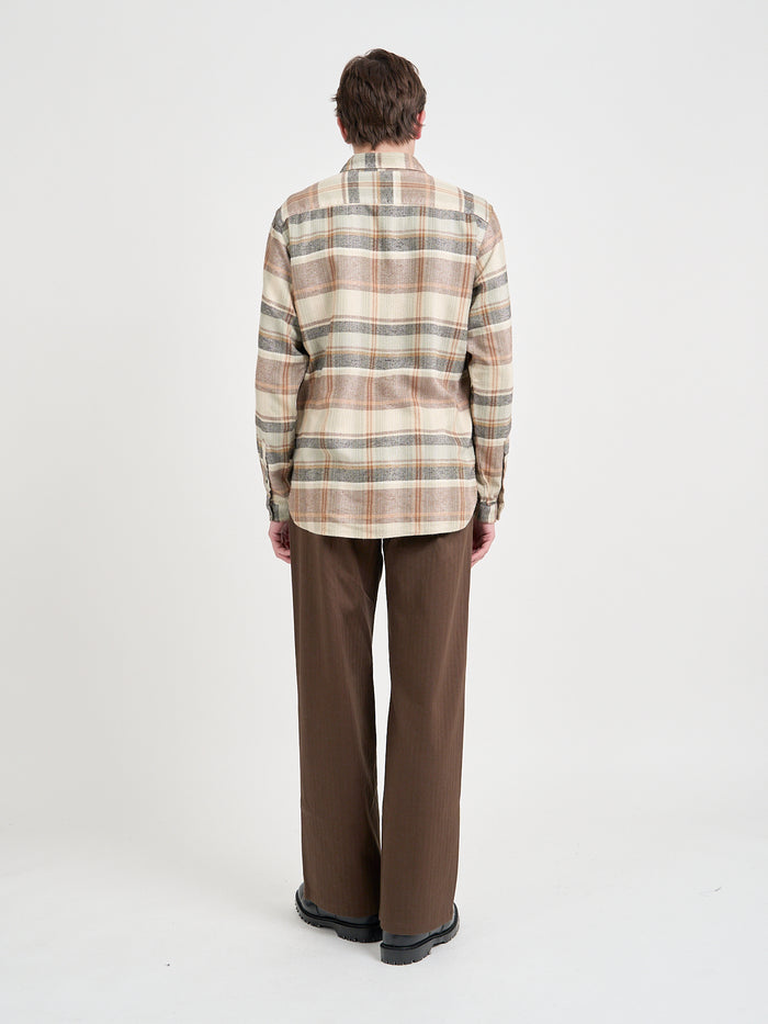 Model is wearing an Oliver Spencer New York Special Shirt in Robbins Multi