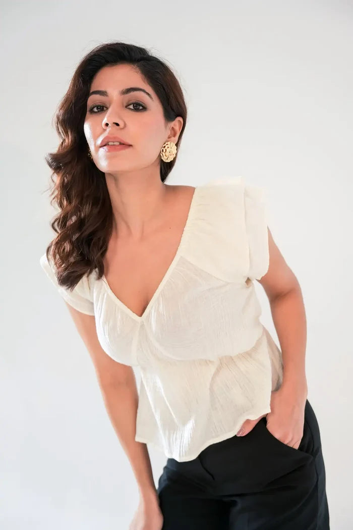 White Cotton Peplum Top with Ruffle Sleeves – Stylish Front Pose | Women’s Casual Outfit