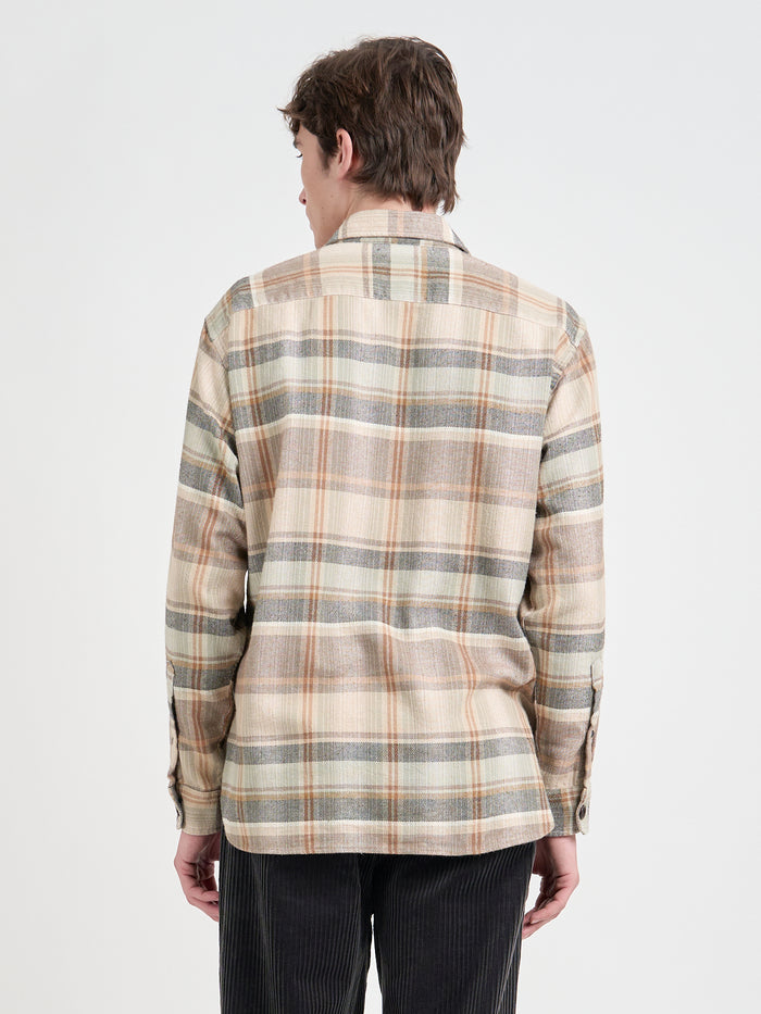 Close up back shot of model wearing an Oliver Spencer Men's Beige Brushed Cotton Check Overshirt