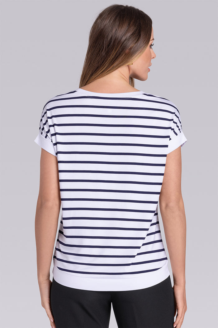 Model wearing Savanna White Deep Sea Blue Icy Bamboo® crew neck short sleeve t-shirt, styled with black pants.