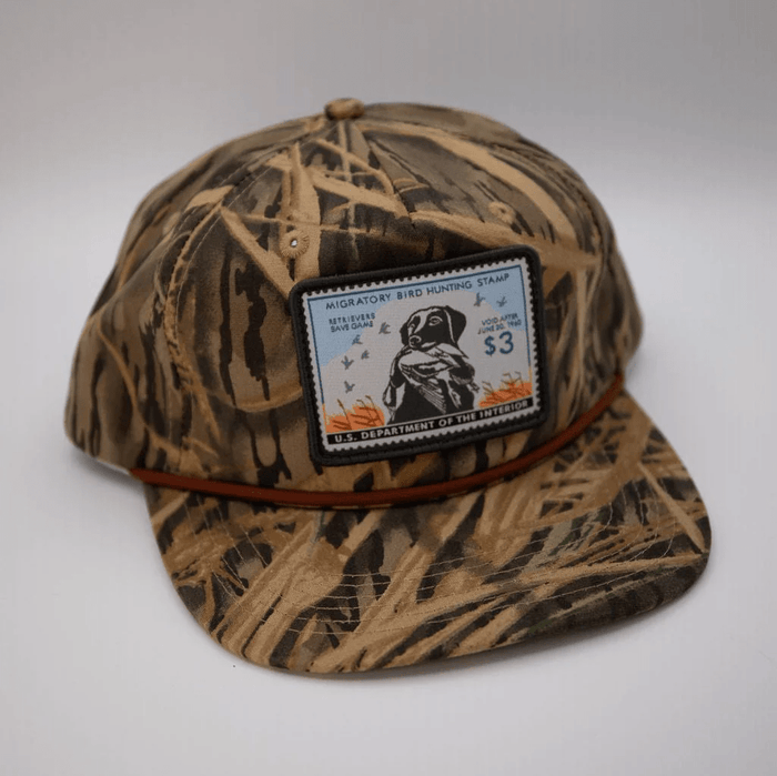 Woodley Co Duck Stamp Hat King Buck 59’-60’ Woodley Co Mossy Oak Shadowgrass Rope Headwear Rivers and Glen Trading Co